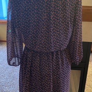 Woman’s pink and blue party dress